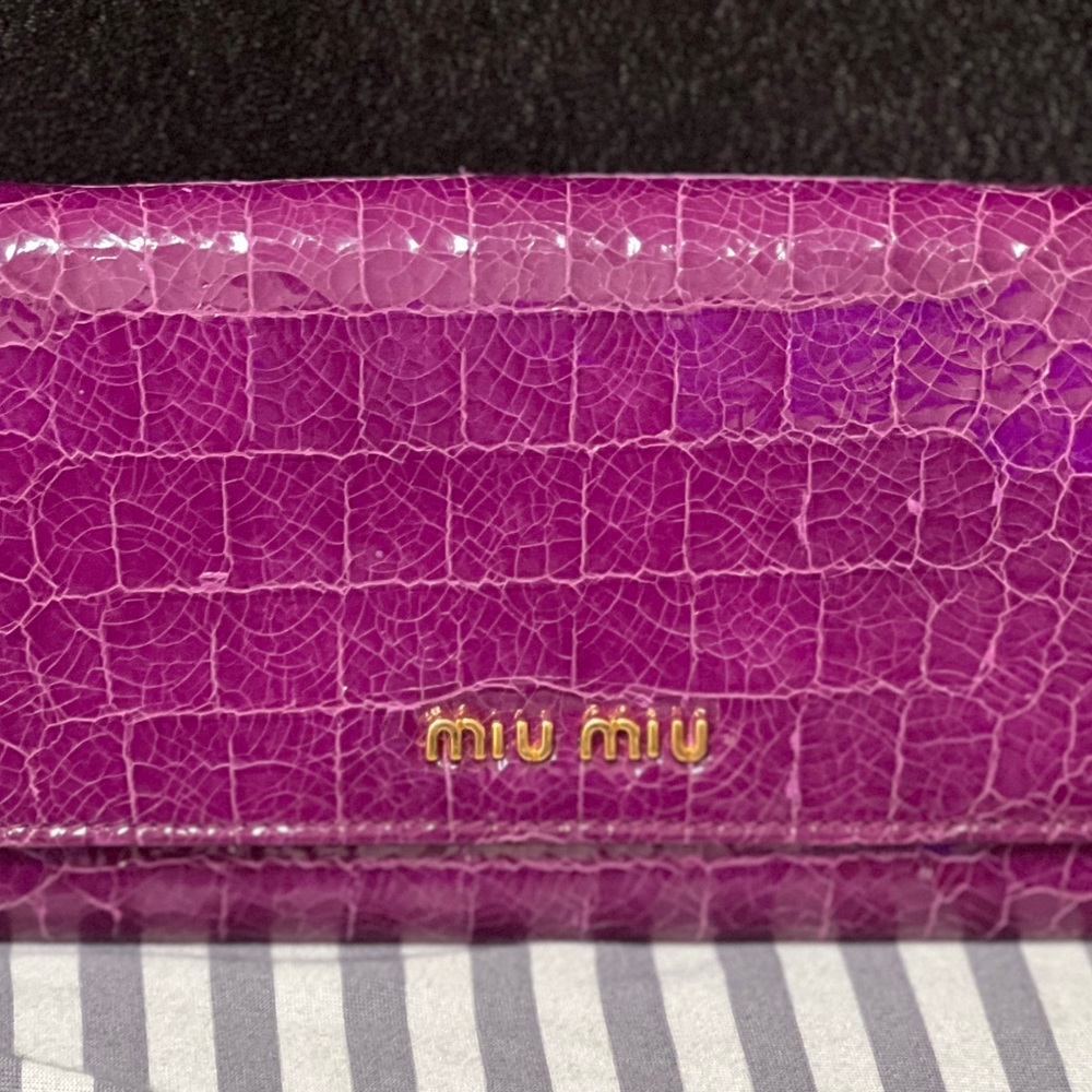 Authentic Miumiu crocodile effect patent leather wallet.